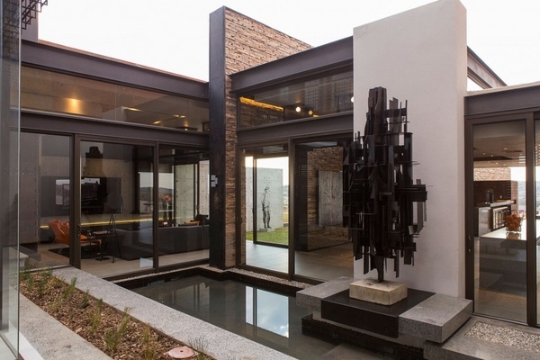  modern house entry pond sculpure