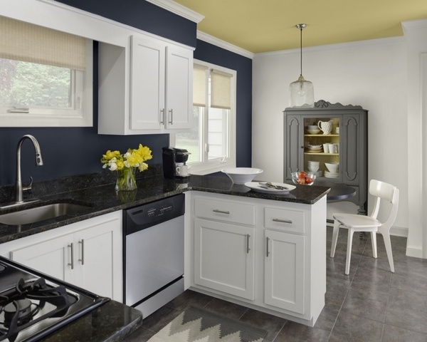 white kitchen cabinets gray floor tiles