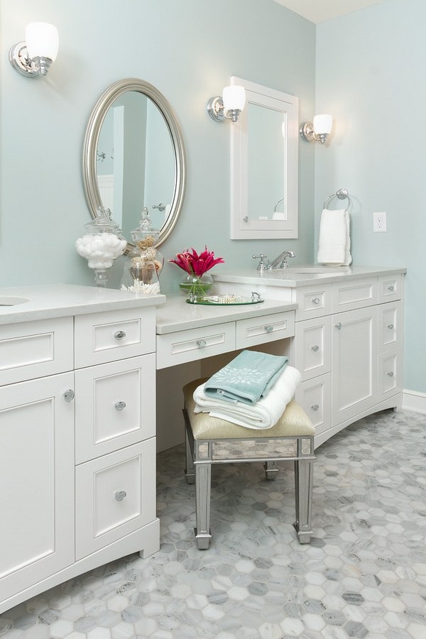 white bathroom vanity pale blue wall color oval wall mirror