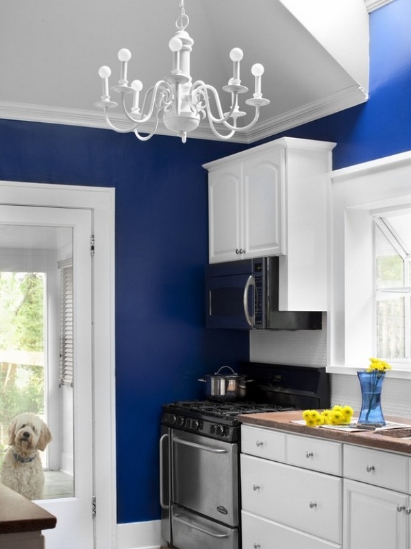 cabinets contrast wall color blue white chandelier