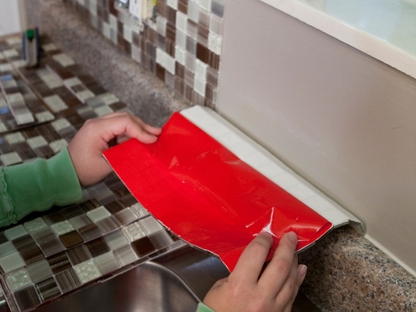 Self adhesive  backsplash  tiles save money on kitchen  