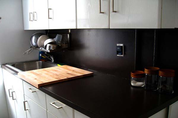 Kitchen countertops black countertop and backslplash white cabinets