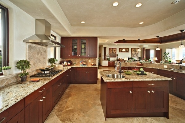 dream-kitchens-dark-cabinetsSanta-Cecilia-granite-countertops-recessed lights