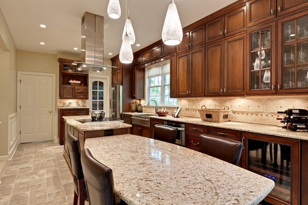 giallo-ornamental-granite-countertops-colors-modern-kitchen-designs-brown-cabinets