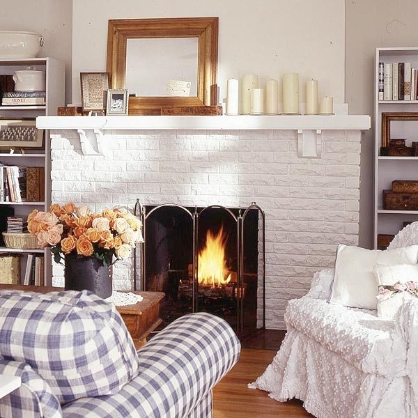 living room with brick fireplace