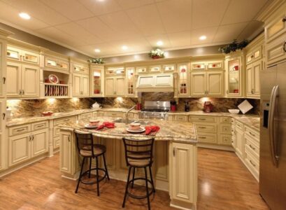 white-kitchen-cabinets-with-antique-glaze-granite-countertops-woo-flooring
