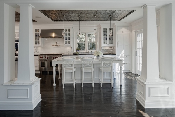 white kitchen design dark wood flooring faux tin ceiling pendant lamps