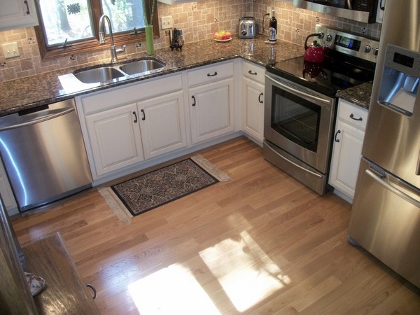 baltic granite countertop white cabinets stainless steel appliances