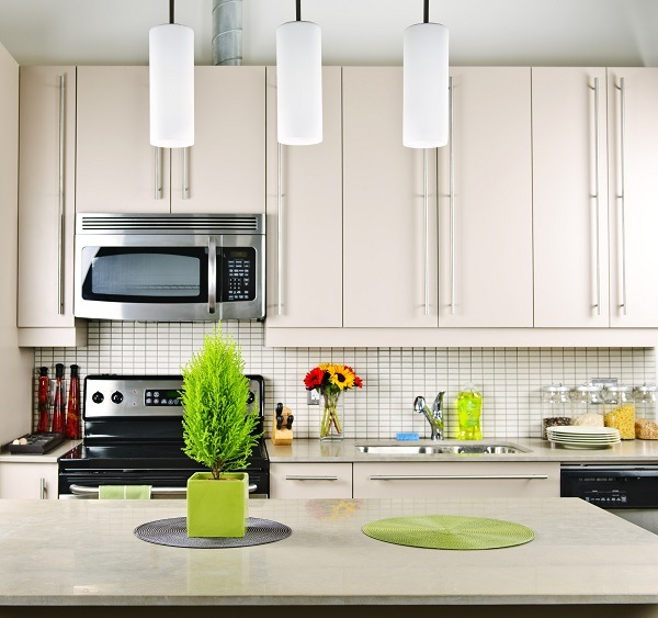 beautiful kitchen white cabinets tile backsplash limestone countertop pendant lamps