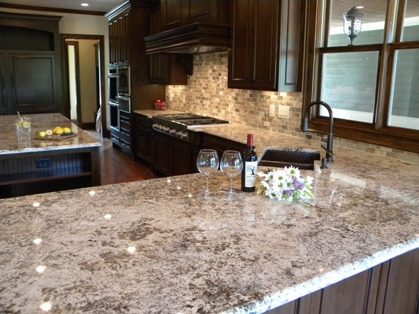 bianco antico granite countertops dark wood kitchen cabinets luxury kitchen countertops