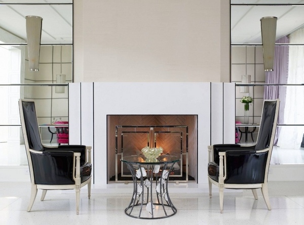 black chairs white terrazzo flooring wall sconces mirrored walls contemporary living room