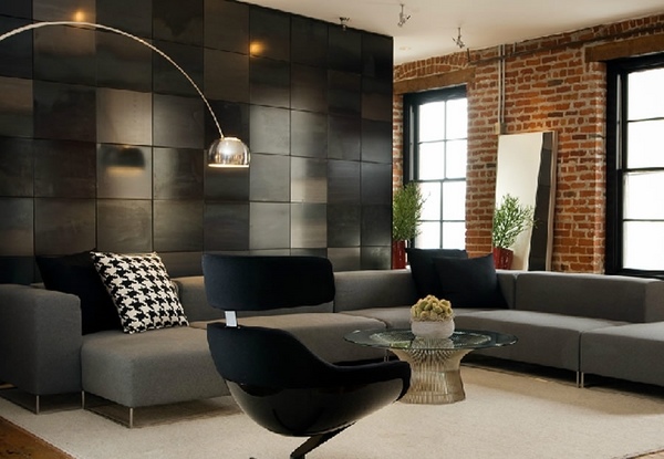 black living room gray sectional sofa brick walls bachelor apartment design