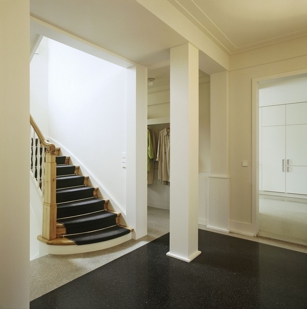 black white flooring home entry design white pillars
