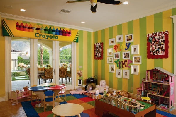 bright playroom design ideas green yellow wall stripes drawing table