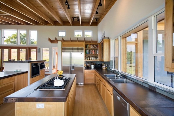 contemporary countertops poured  wood cabinets ceiling beams