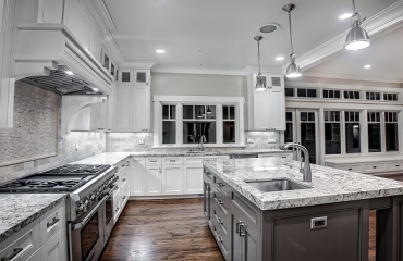 contemporary-kitchen-white-ice-granite-countertops-modern-kitchen-lighting-white-cabinets