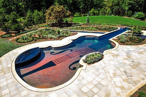 glass tile inground pool violin shape amazing patio ideas