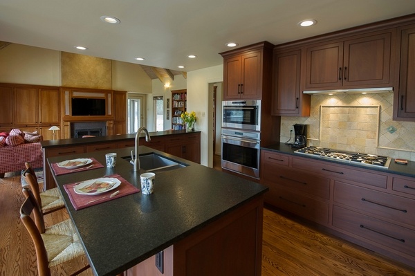 modern kitchen black pearl granite countertops dark wood cabinets