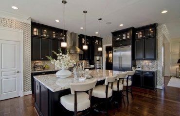 modern-kitchen-design-new-caledonia-granite-countertops-black-kitchen-cabinets