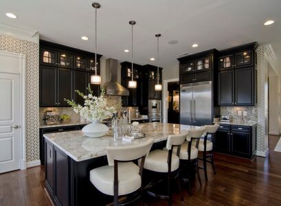 modern-kitchen-design-new-caledonia-granite-countertops-black-kitchen-cabinets