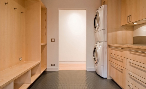 modern laundry room rubber floor wood cabinets