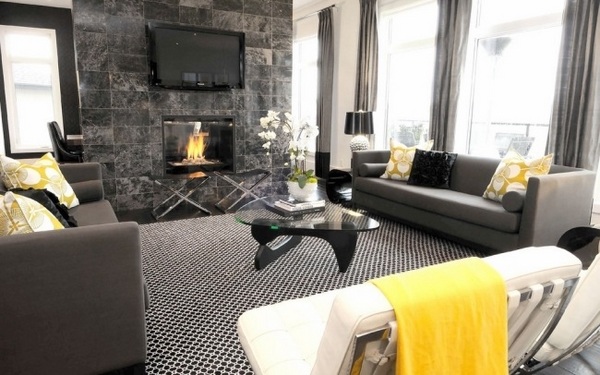 modern interior tv mounted over fireplace black white gray carpet