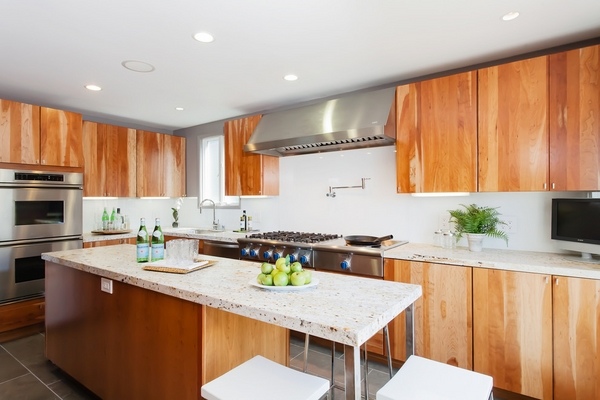 trendy kitchen countertops limestone countertop wood cabinets recessed lighting