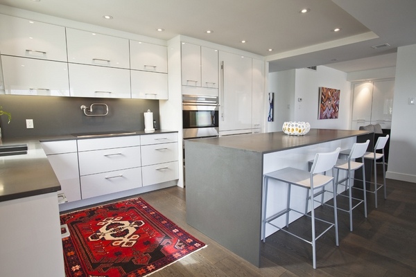  white cabinets gray Caesarstone countertop gray backsplash