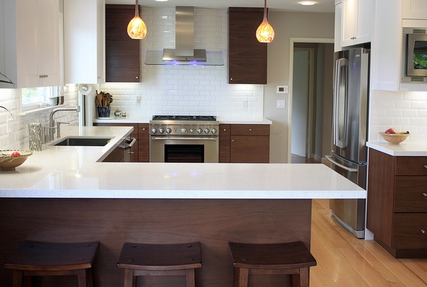 white countertops Caesarstone countertop wood cabinets modern kitchen design