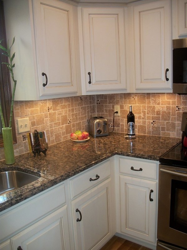 white kitchen cabinets granite countertop tile backsplash 