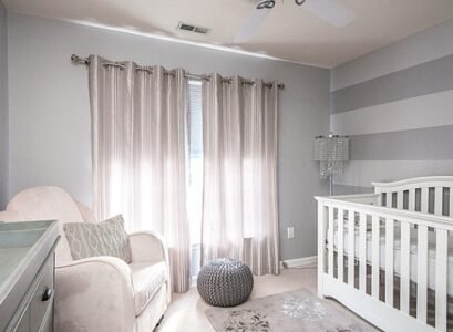 Elegant-small-nursery-design-white-gray-colors-wall-stripes-baby-cot-armchair-changing-table