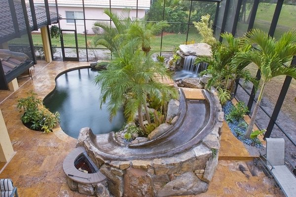 amazing indoor swimming pools ideas tropical decor rocks palm trees 