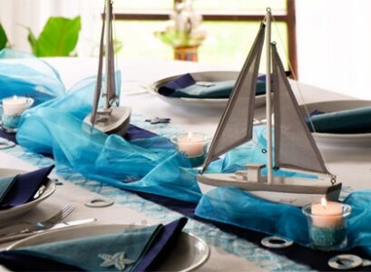 beach-theme-party-organza-table runners-ideas-waves-candles-sailing-boats