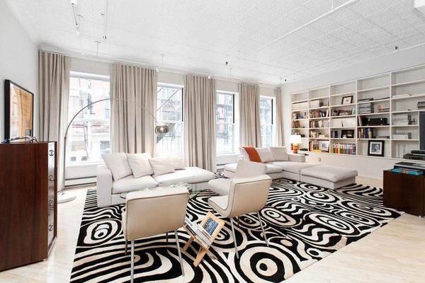 chic-loft-apartment-modern-living-room-extravagant-carpet-white-sectional-sofa-set-open-shelves