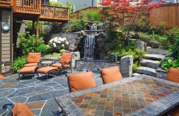 contemporary-patio-design-flagstone-patio-flooring-water-feature-waterfall