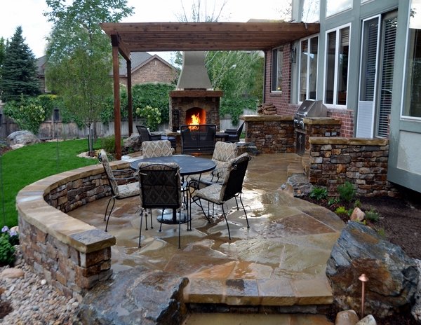 design stone fireplace outdoor kitchen 
