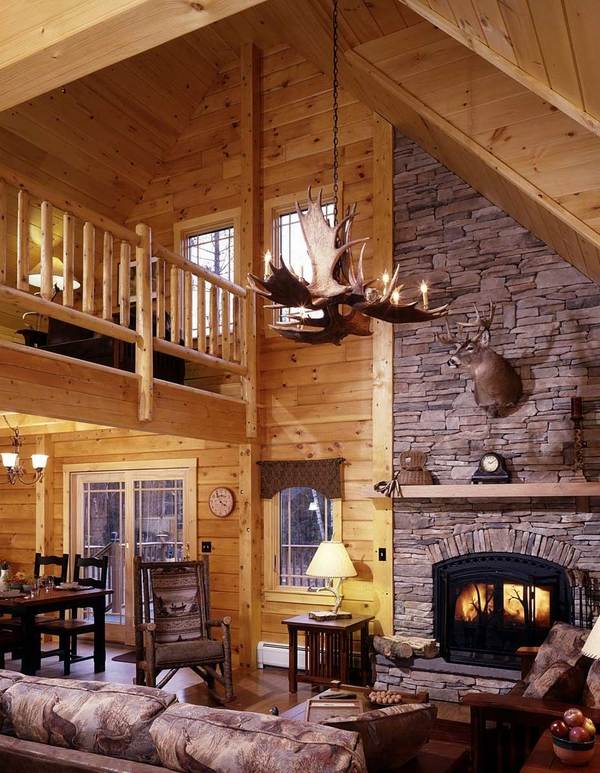 living room decor antler chandelier rustic interior stone fireplace