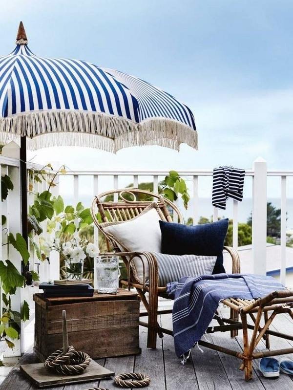 mediterranean style balcony white blue colors parasol daybed