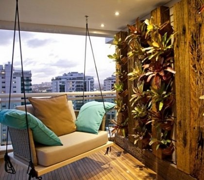 modern-balcony-ideas-vertical-garden-wood-flooring-swing-decorative-pillows