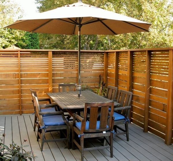modern garden fence privacy fence ideas wood panels outdoor dining furniutre