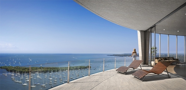 modern home balcony glass railings panorama view lounge chairs