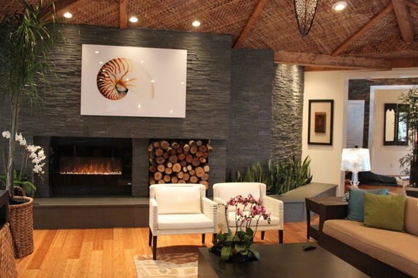 modern interior stone fireplace wood floor sofa armchairs