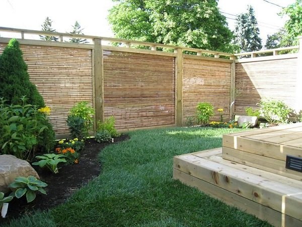 patio design ideas bamboo fencing panels wood deck lawn