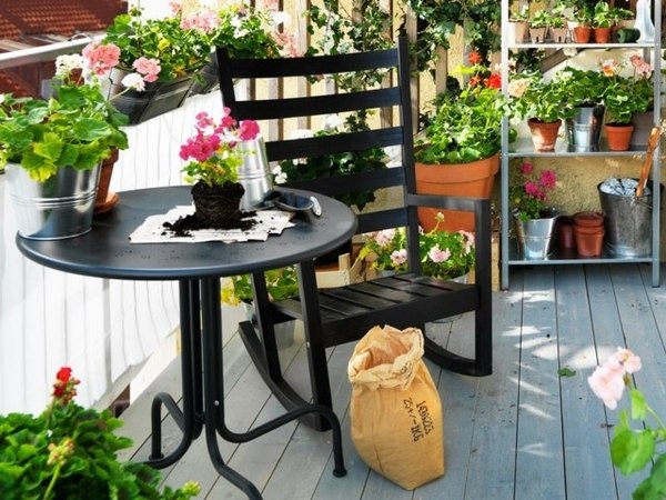  balcony design ideas flowerpots garden furniture rocking chair round table
