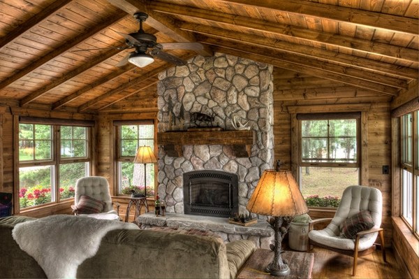 small rustic interior stone fireplace seating furniture