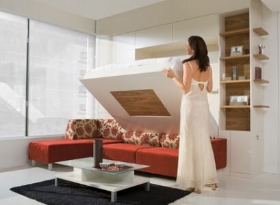 space-saving-furniture-ideas-red-sectional-sofa-murphy-sofa-bed-low-coffee-table