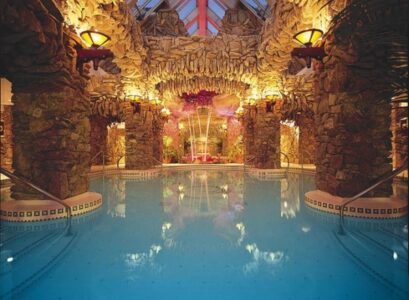 spectacular-indoor-pool-designs-grotto-swimming-pool-lighting-ideas