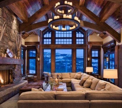 spectacular-rustic-living-room-interior-design-big-sectional-sofa-stone-fireplace-wrought-iron-chandelier