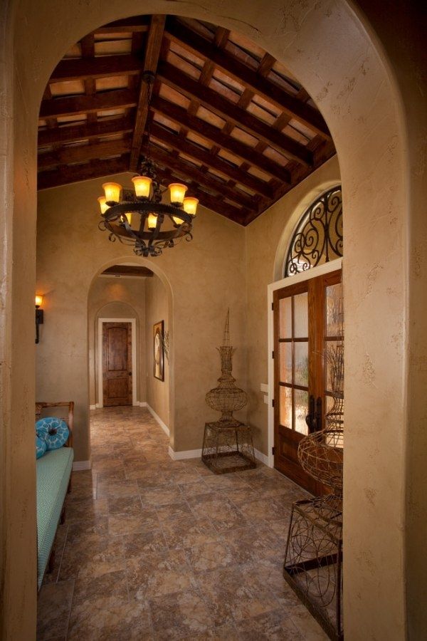 Mediterranean interior design ideas interior wall plaster wrought iron chandelier