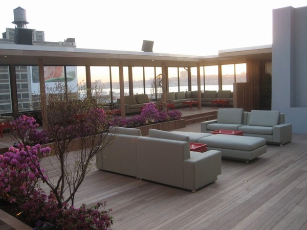 Rooftop garden ideas wooden deck leather furniture planter boxes